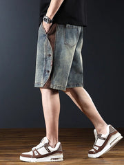 Men's wide leg denim shorts in medium wash with buttoned corduroy side panel