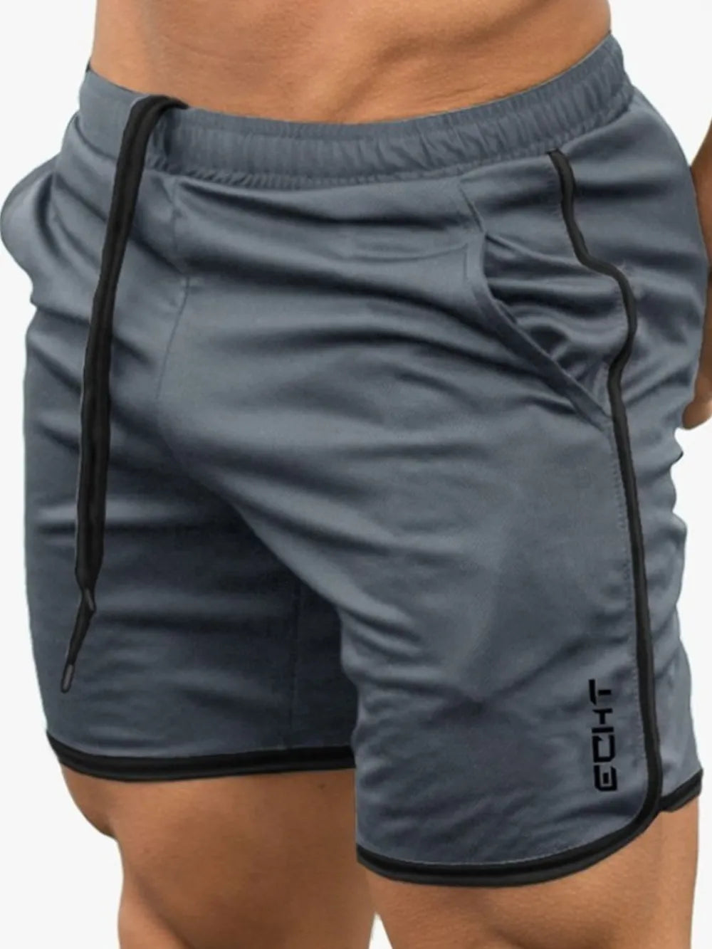 Dark gray performance shorts with black contrast piping and drawstring.