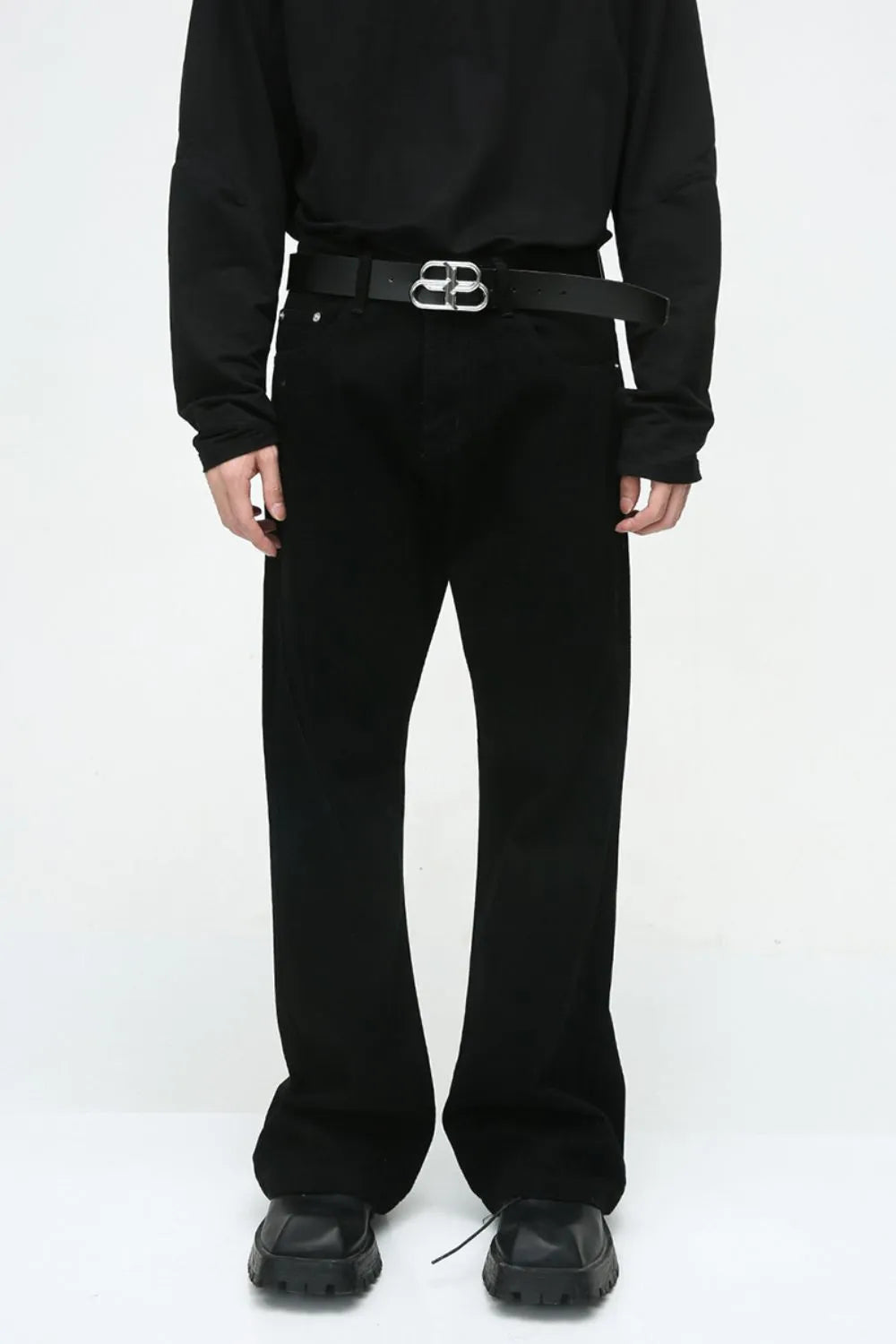 Sculpted bootcut denim trousers in dark, with a classic fit and a silver buckle belt.