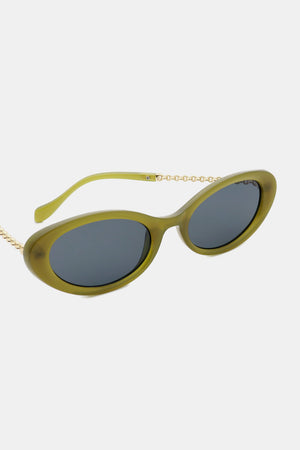 Olive oval sunglasses with gold chain detail and dark lenses