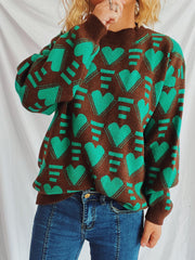Brown acrylic knit jumper with a green geometric heart pattern, crew neck, and long sleeves.