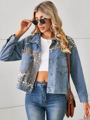 Denim trucker jacket with serpentine print panels, distressed details, and chest pockets.