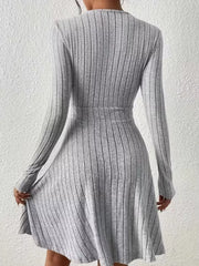 Light Gray ribbed wrap mini dress with long sleeves and an a-line skirt.