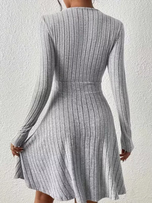 Light Gray ribbed wrap mini dress with long sleeves and an a-line skirt.