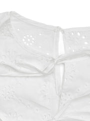White eyelet bodysuit with floral embroidery and tie-back detail