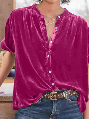 Velvet button-down top in plum purple with mandarin collar and short sleeves.