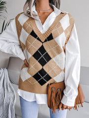 Argyle knit v-neck sweater vest in tan, white, and black acrylic.