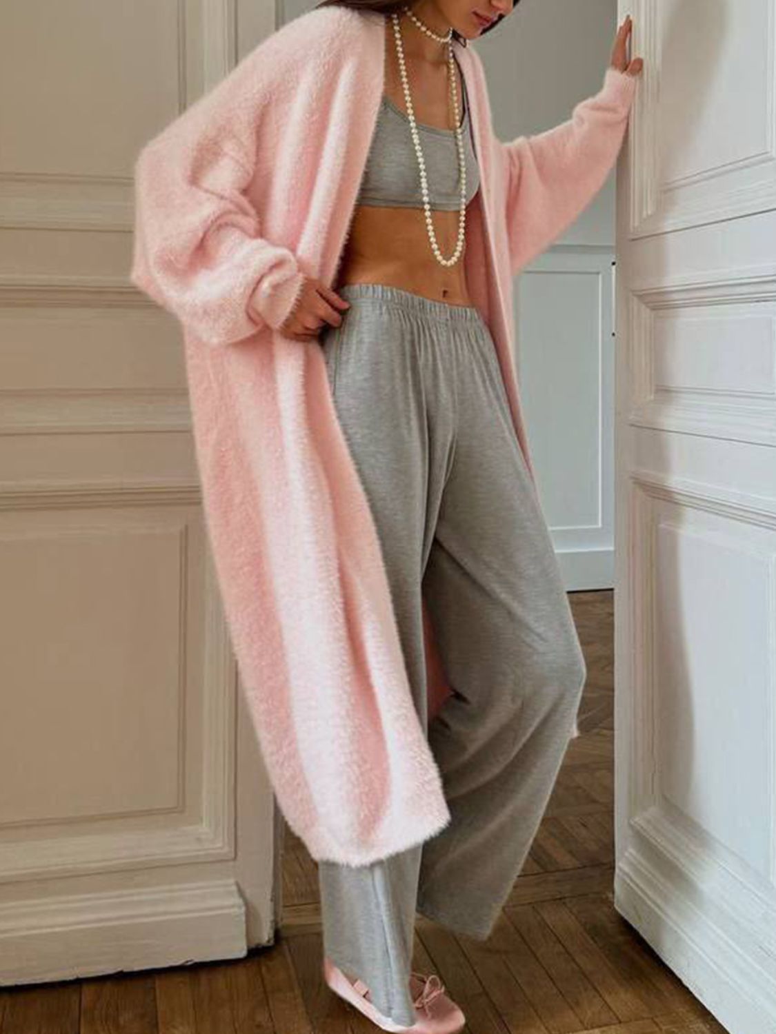 Plush pink maxi cardigan with balloon sleeves and open front, styled with grey loungewear.