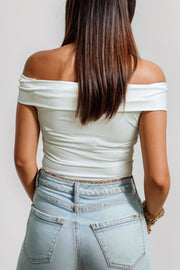 White off-the-shoulder sculpted bodice top with a bare back and casual styling.