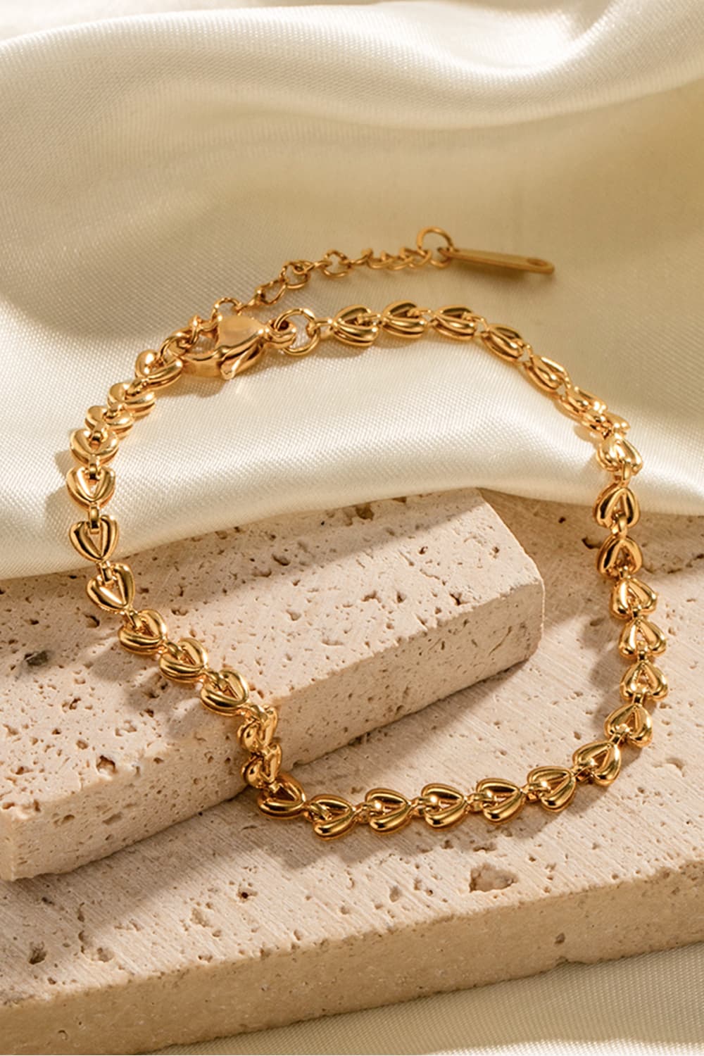 Gold linked heartbeat chain bracelet with adjustable clasp