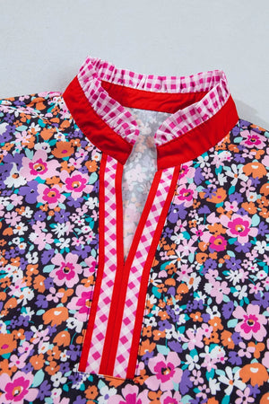 Floral print v-neck shirt with red trim and pink gingham collar detail