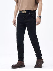 Black cotton slim fit moto jeans with ribbed panels and button fly.