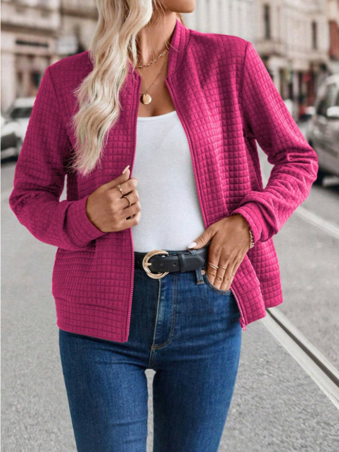 Quilted bomber jacket in Deep Rose with zip closure and stand-up collar.