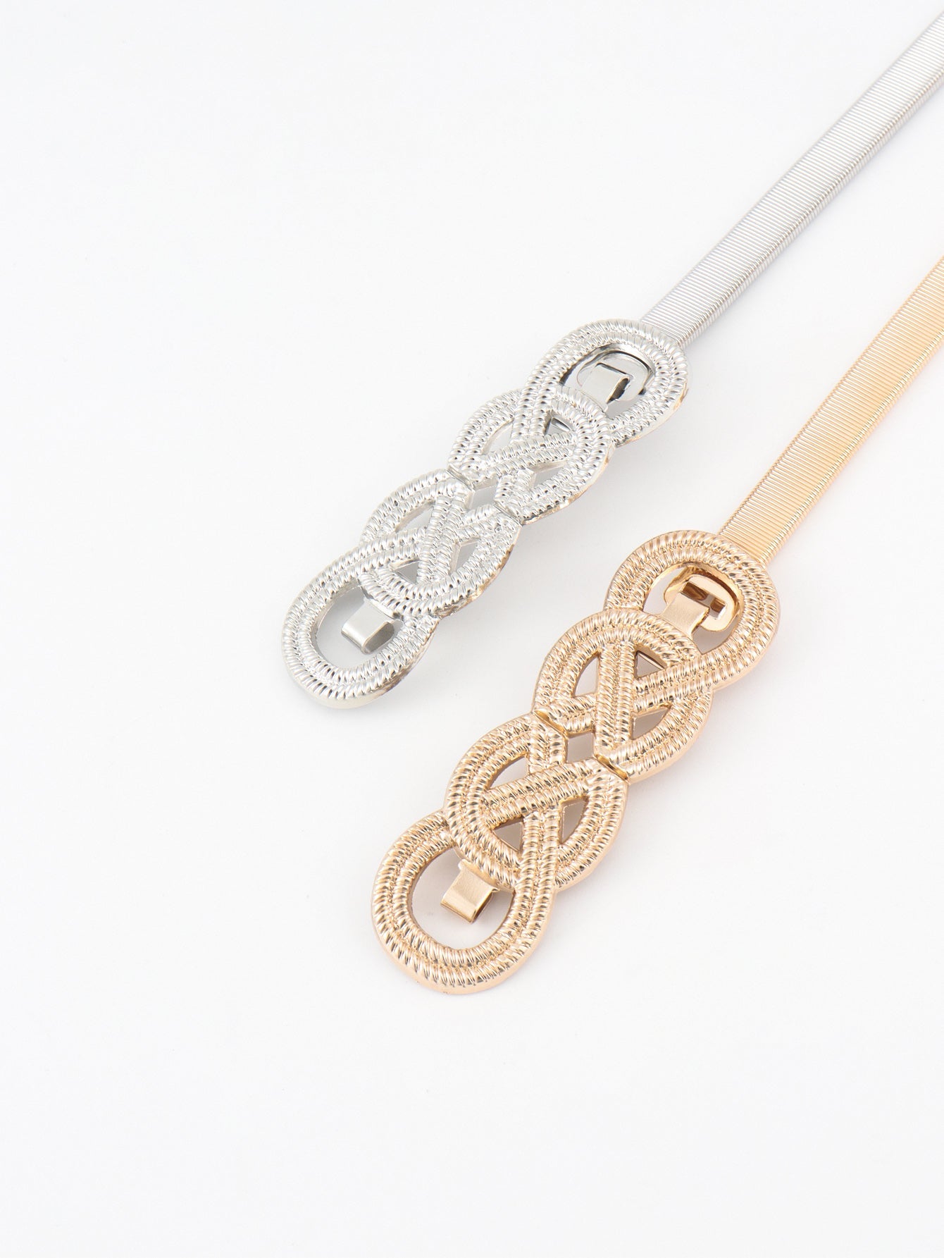Gold and silver intertwined knot metal waist belts with elastic bands.