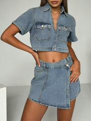 Light wash denim cropped button-down top and mini skort set with short sleeves and dual chest pockets.