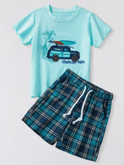 Toddler graphic tee with car and surfboard, and plaid shorts set.