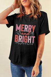 Black cotton tee with rolled sleeves and "Merry and Bright" Christmas graphic.