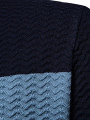 Chevron stripe knit polo shirt in dark navy and light blue with textured chevron pattern.