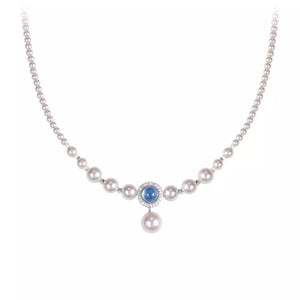 Luminous pearl choker with blue stone pendant and 925 silver accents