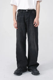 Black wide-leg denim jeans with a relaxed fit and urban style.