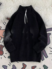 Men's black half-zip sweater with high neck and fuzzy texture.