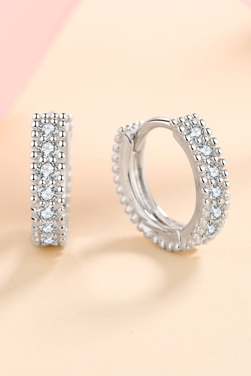 Silver hoop earrings with pavé and beaded details, perfect for daily wear.