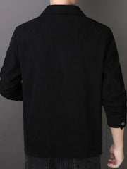 Black corduroy button-down jacket with buttoned cuffs.