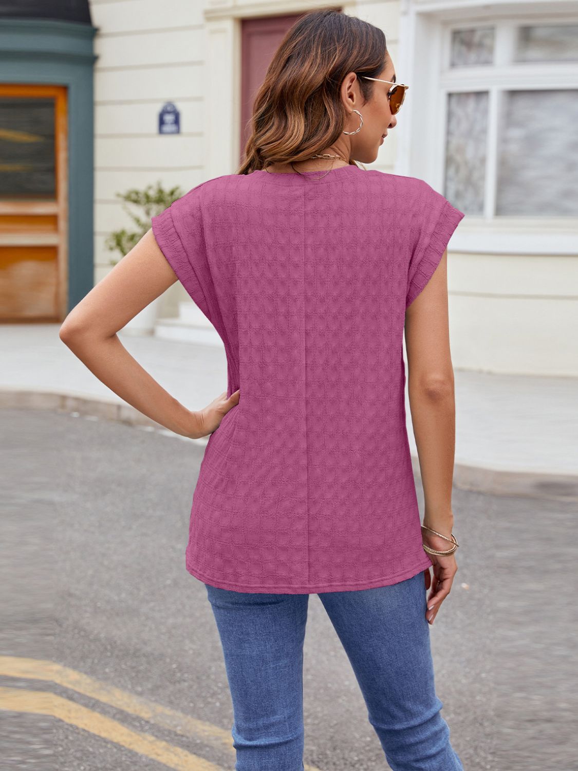 Textured cap-sleeve tee in Fuchsia with subtle knit pattern.