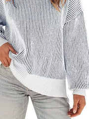 100% polyester Care instructions: Machine wash cold pullover sweater in Pink with relaxed silhouette