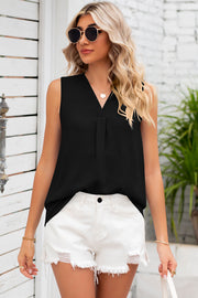 Black sleeveless blouse with V-neck and textured fabric with a front pleat detail.