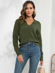 Army green cable knit polo neck jumper with V-neck and long sleeves.