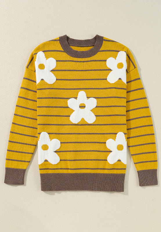 Yellow striped knit sweater with white daisy intarsia and brown trim.