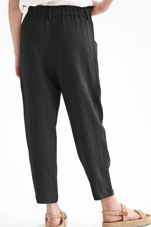 Black linen-blend trousers with button pockets and a relaxed fit.
