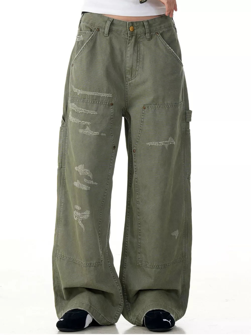 Olive green distressed wide-leg carpenter pants with cargo pockets and a relaxed fit.