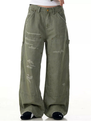 Olive green distressed wide-leg carpenter pants with cargo pockets and a relaxed fit.