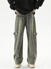 Vintage-inspired wide-leg cargo jeans in faded grey denim with button-flap side pockets.