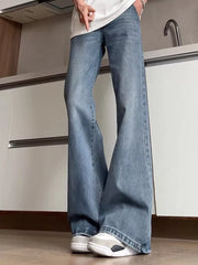 Men's distressed full-length flare jeans in light blue cotton blend with subtle rips.