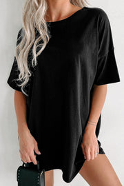 Black oversized slouch tee dress with crew neck and short sleeves.