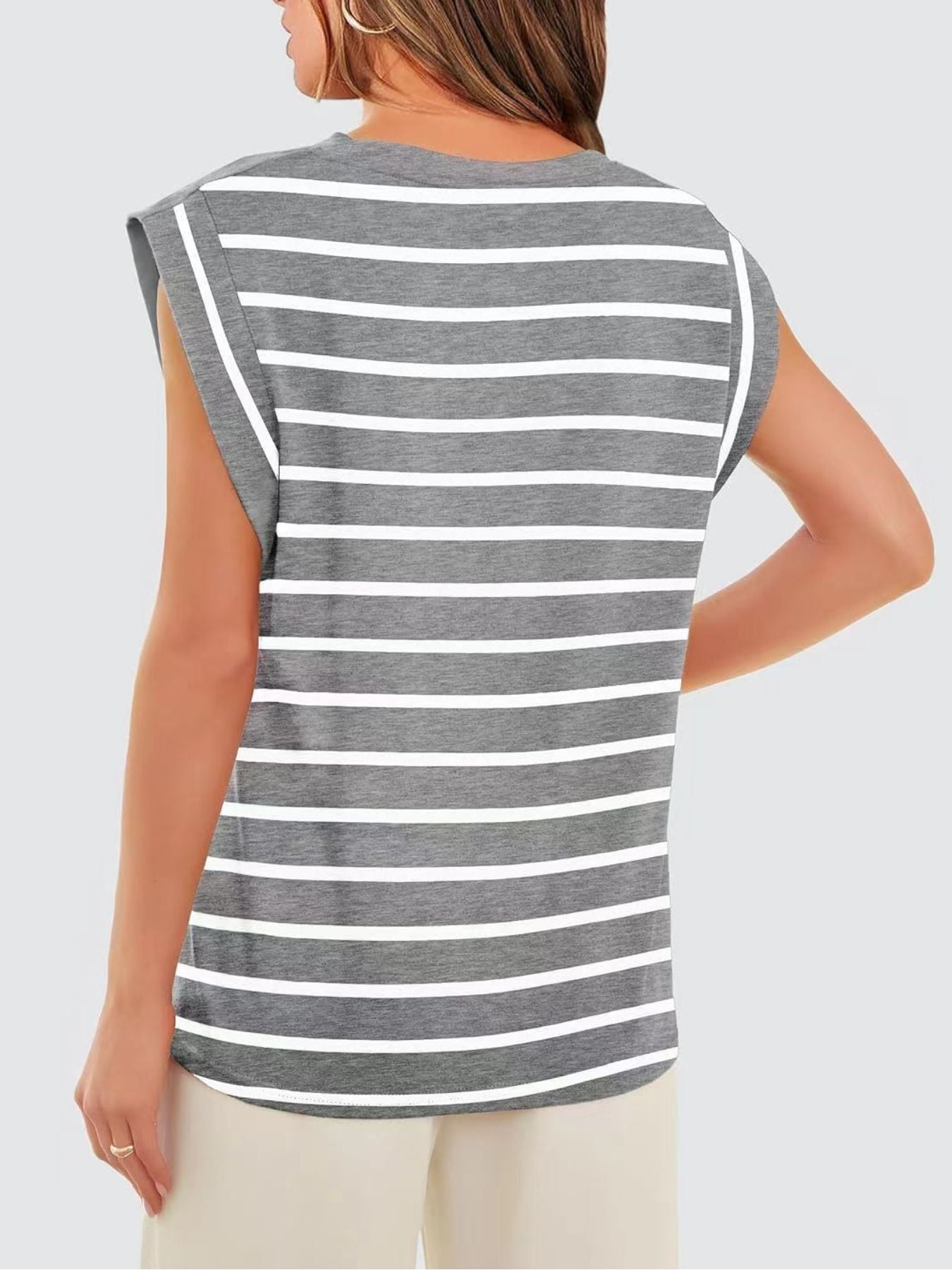 Gray and white striped sleeveless tank top with a round neckline.