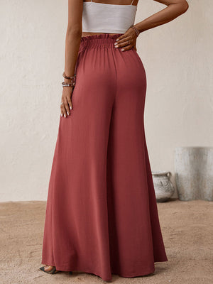 Ruffled waist palazzo trousers in rust, wide leg, casual flowy fit.