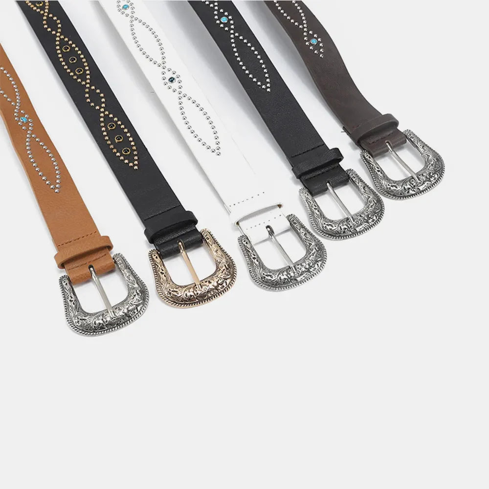 Western studded faux leather belts in black, white, caramel, and coffee brown with antique buckles.