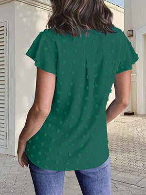Dark green flutter sleeve Swiss dot blouse with a v-neck and relaxed fit.