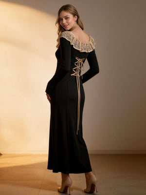 Black A-line dress with lace collar, long sleeves, and corset back detail.