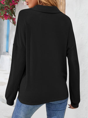 Black waffle knit henley blouse with collar and long sleeves