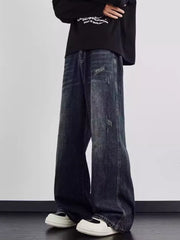 Distressed dark wash wide leg men's jeans with a relaxed fit.