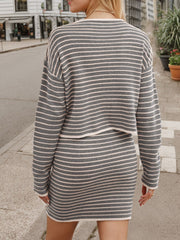 Gray striped knit co-ord set with a cropped sweater and mini skirt.