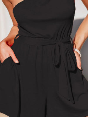 Black asymmetrical knot-waist romper with pockets and tie detail