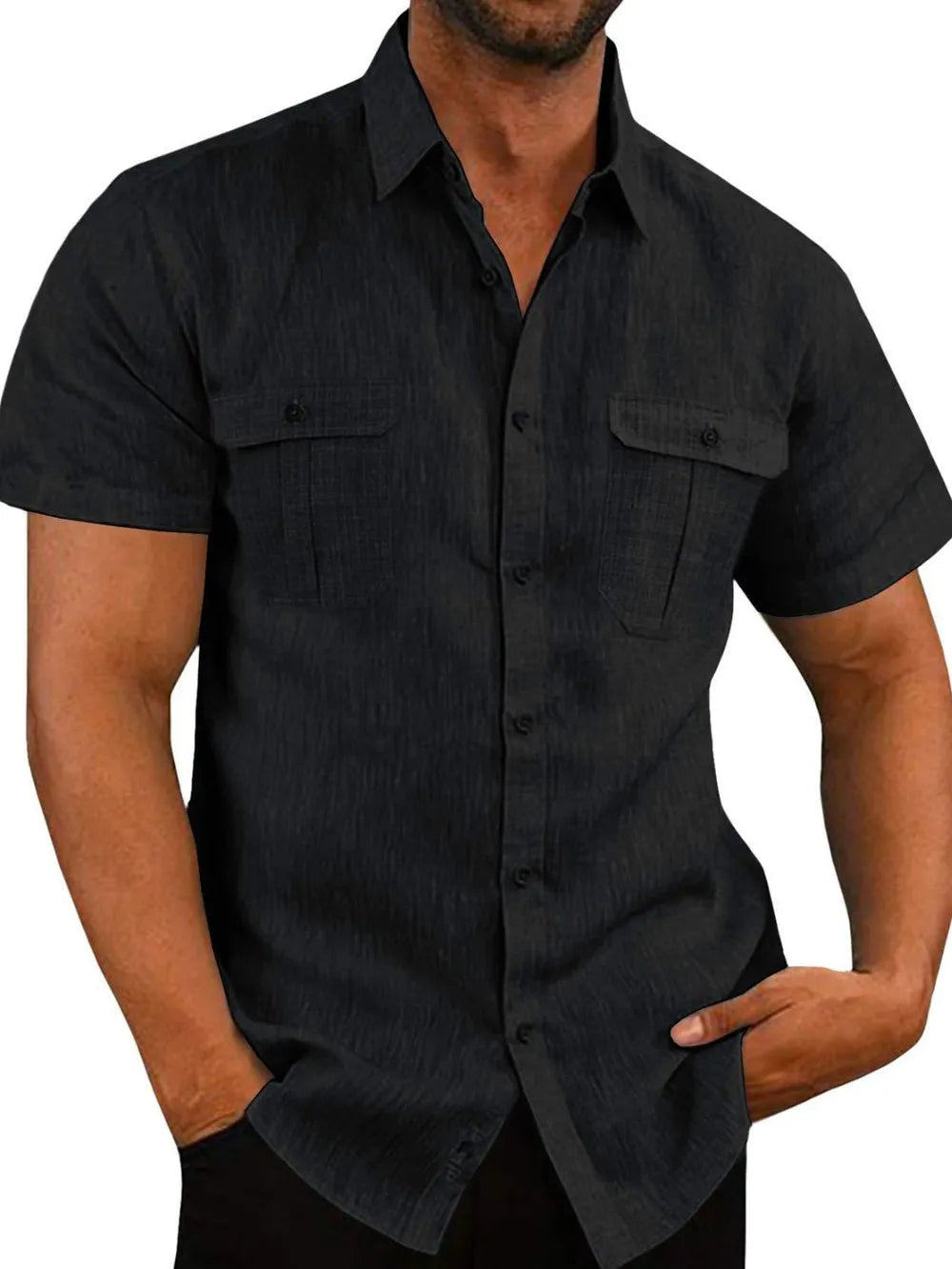 Men's black textured linen utility shirt with short sleeves and two chest pockets.