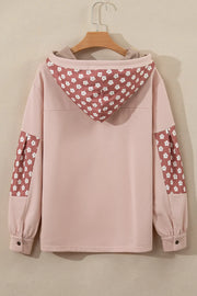 Dusty pink hoodie with floral patchwork on the hood and sleeves, button cuffs.