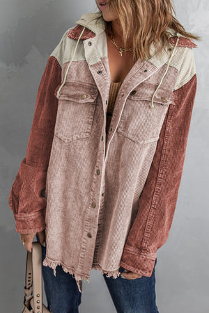 Colorblock corduroy hooded utility jacket with distressed hem and chest pockets.